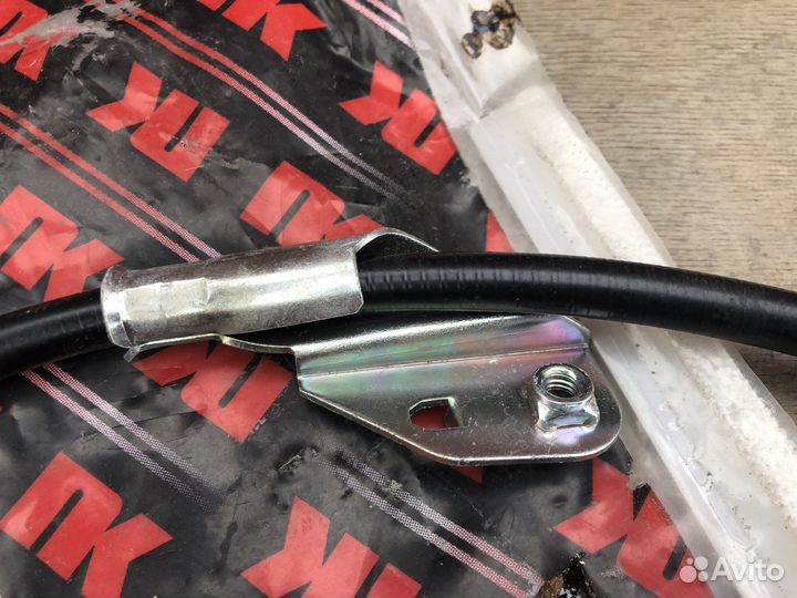 Трос ручника правый Nissan Almera