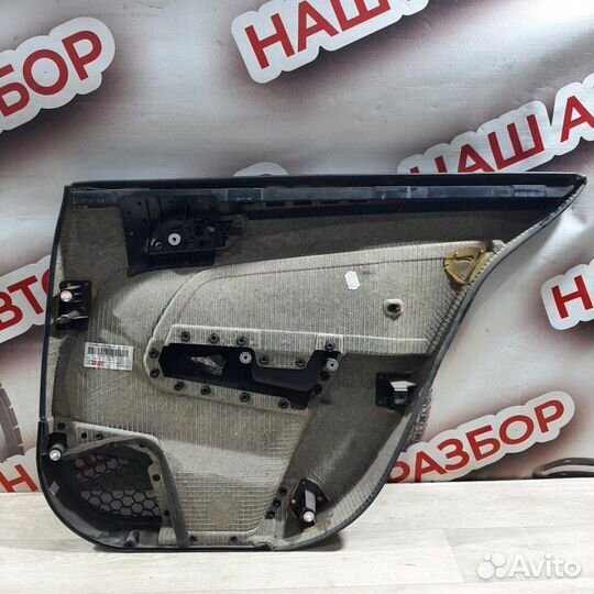 Обшивка боковой двери задняя левая Opel Astra H