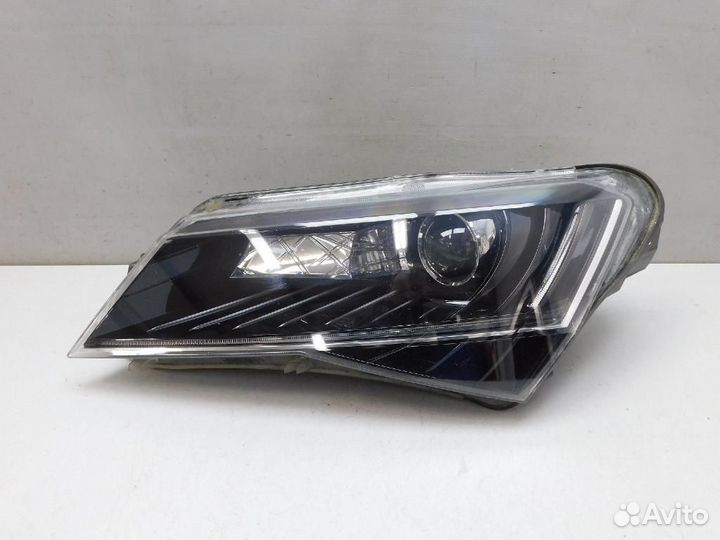 Фара левая Skoda Superb