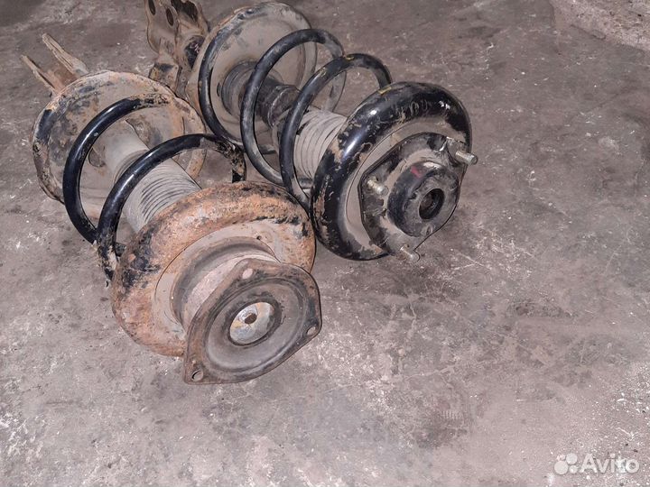 Передняя стойка амортизатора nissan maxima a32