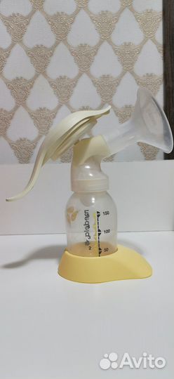 Молокоотсос medela ручной