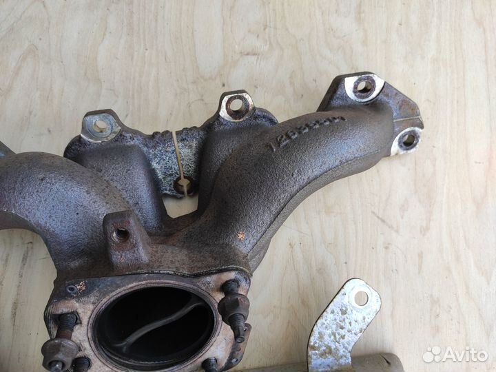 Коллектор выпускной A20NFT Opel Astra J Insignia