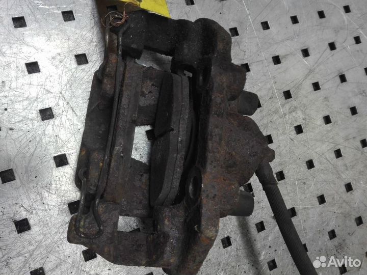 Суппорт передний правый Opel Astra F