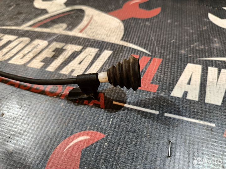 Трос лючка бензобака Opel Astra H