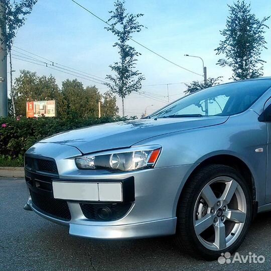 Клыки переднего бампера Митцубиси Лансер 10