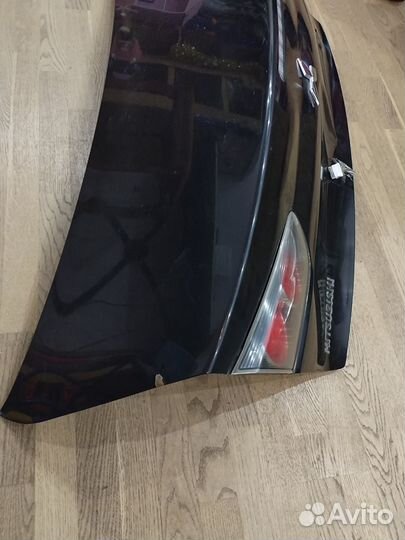 Крышка багажника mitsubishi lancer