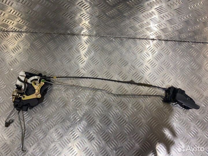 Замок двери передний левый Mitsubishi Lancer 9