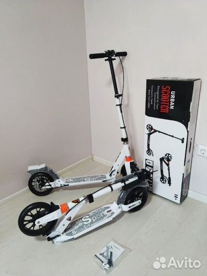 Двухколесный самокат с ручным дисковым тормозом