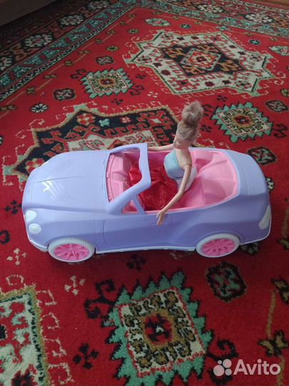 Детская игрушка машина -каталка