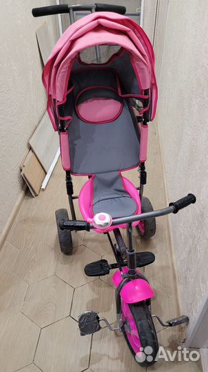 Трехколесный велосипед с ручкой