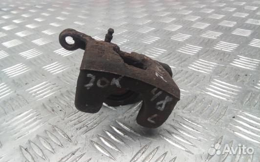 Суппорт тормозной задний левый nissan qashqai J10 (7OK48LS01)