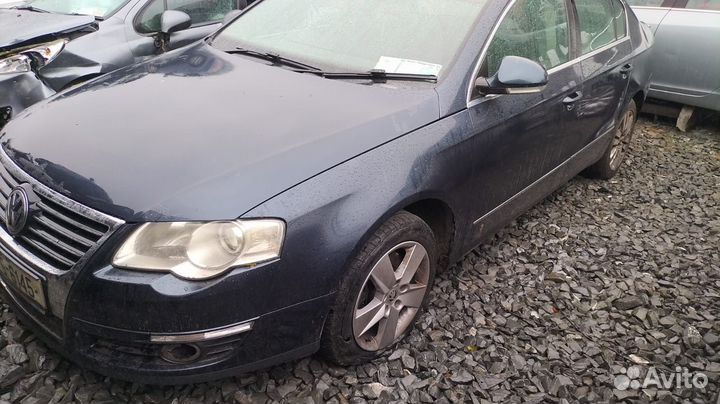 Фара левая Volkswagen Passat B6