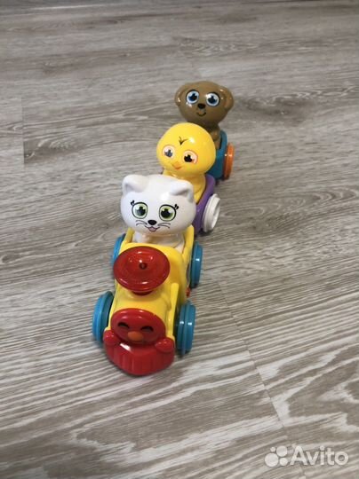 Весёлый паровозик музыкальный и каталка волчонок