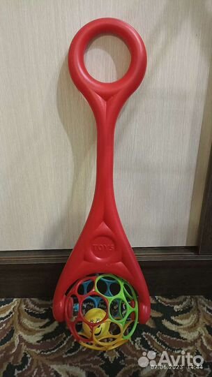 Игрушка каталка