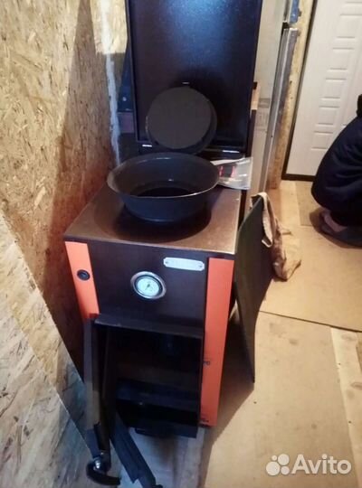 Дровяной отопительный котел с водяным контуром