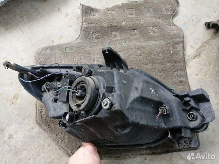 Фара передняя левая Mazda Demio DY