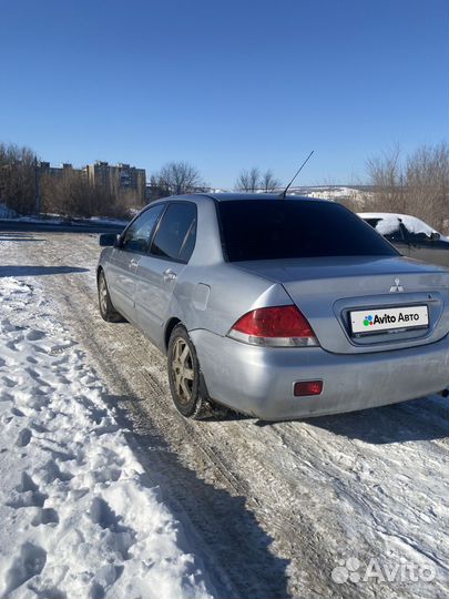 Mitsubishi Lancer 1.6 МТ, 2006, 304 700 км