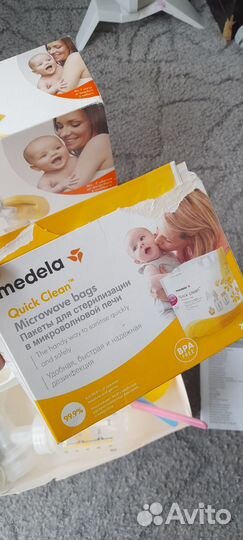 Молокоотсос Medela электрический пакеты бутылочки
