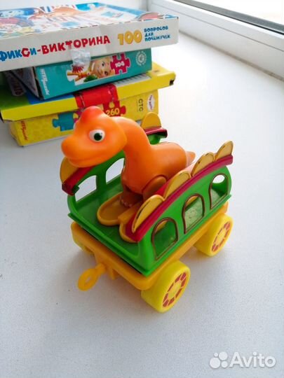 Игрушка динозавр