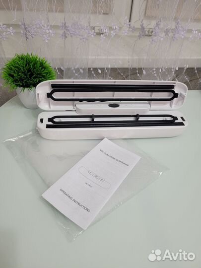 Вакуумный упаковщик новый