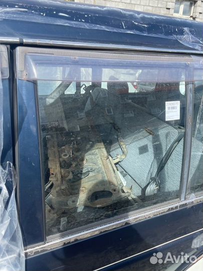 Стекло двери заднее левое Mitsubishi Pajero V46