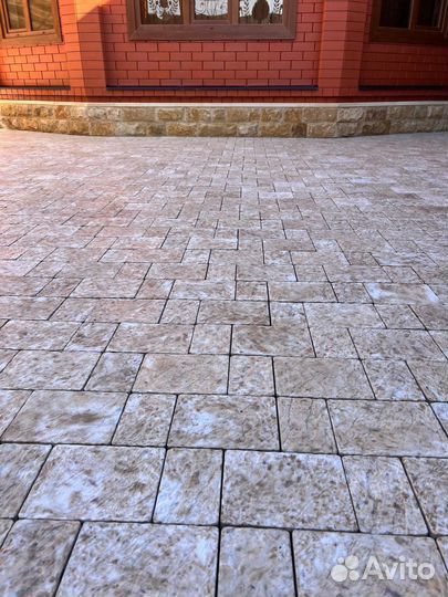 Укладка тротуарной плитки брусчатки