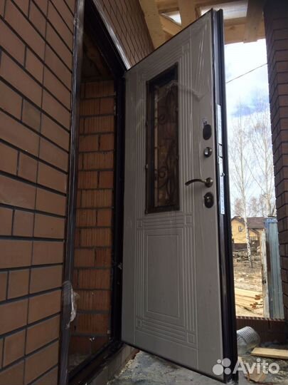 Дверь входная металлическая с ковкой 