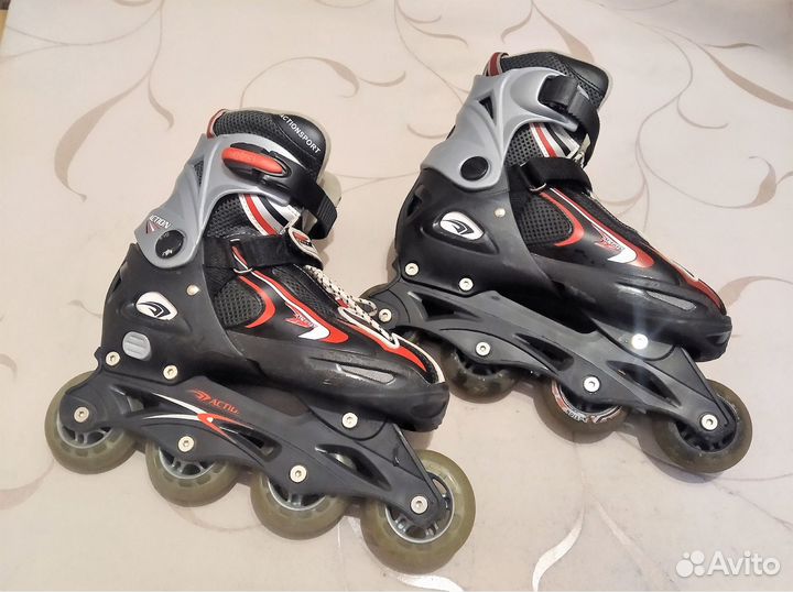 Роликовые коньки