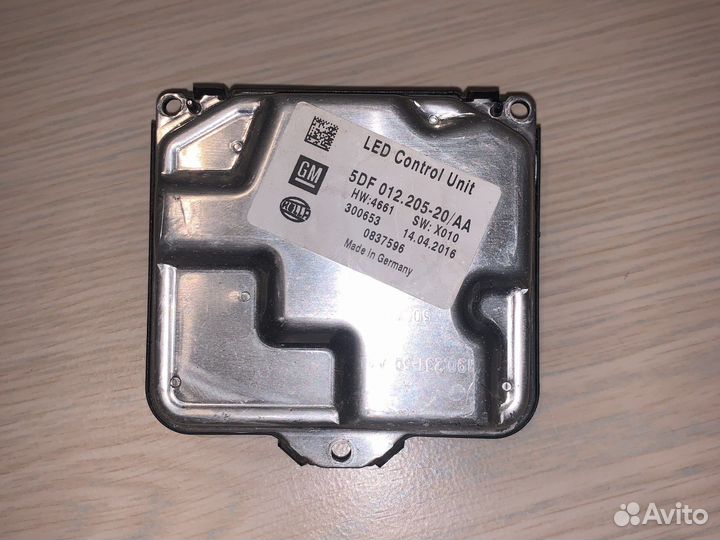 Блок управления led фарой на кадиллак xt5