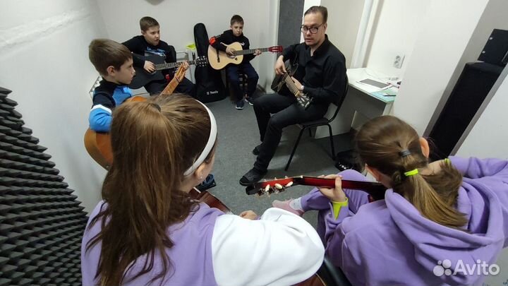 Обучение игре на гитаре