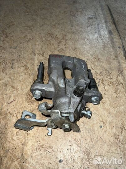 Суппорт тормозной Тойота Королла 150