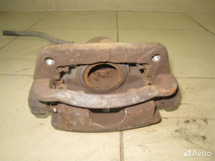 Суппорт тормозной передний левый KIA Picanto (BA)