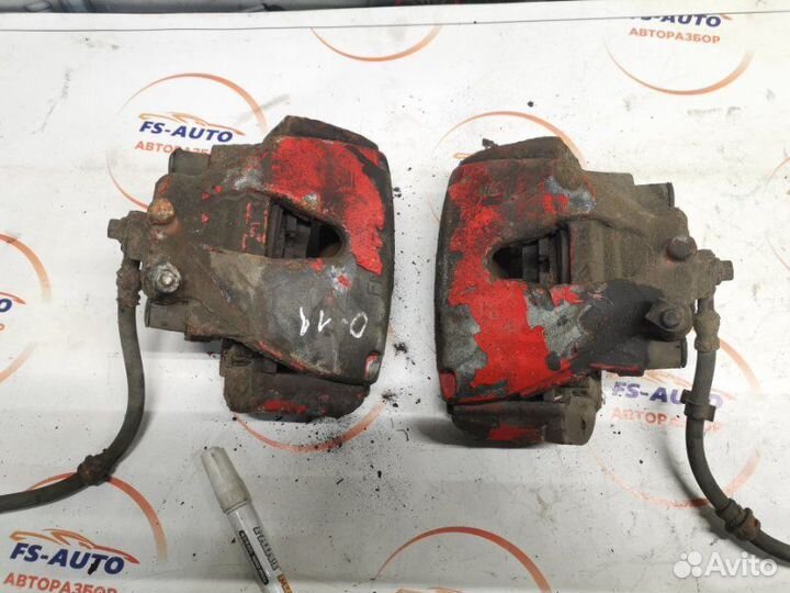 Суппорт тормозной передний Opel Astra H хетчбек