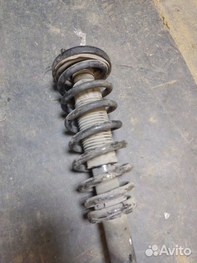 Стойка амортизатора передняя левая Honda Accord 7