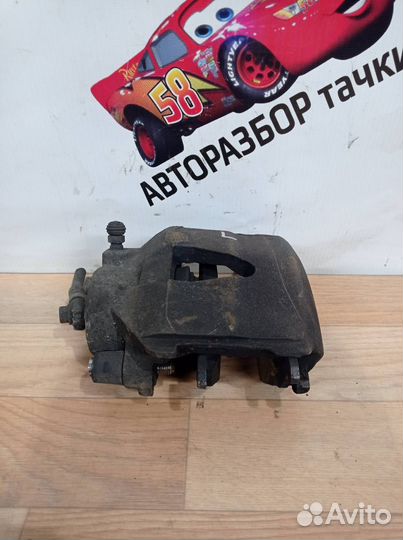 Суппорт тормозной передний левый Volkswagen Polo 5