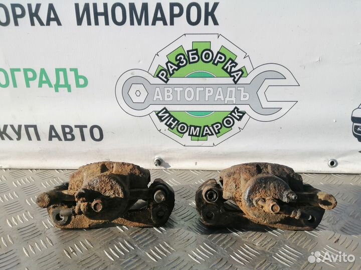 Суппорт тормозной передний Mazda 626 GE 95г