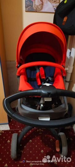 Коляска стокке stokke