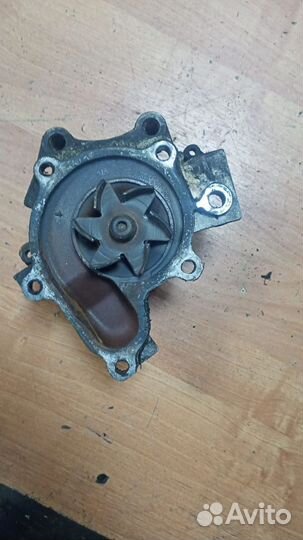Помпа Водяной насос Mazda 626 GE FS 2.0