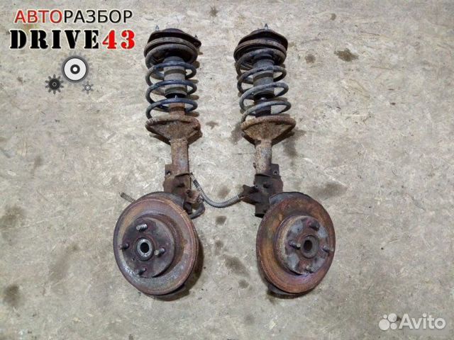 Амортизатор передний Mitsubishi Carisma 1995-1999