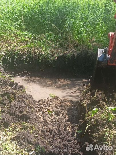 Услуга миниэкскаватора