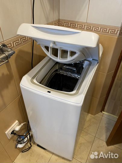 Стиральная машина с вертикальной загрузкой
