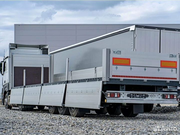 Водитель категории Е на бортовой полуприцеп