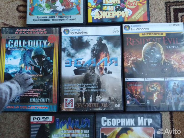 Пять дисков с играми + два диска с мультами