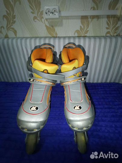 Роликовые коньки