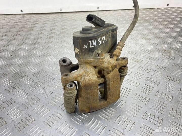 Суппорт тормозной задний правый Volkswagen Tiguan