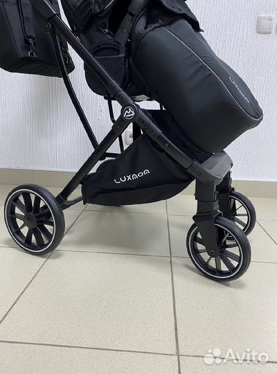 Прогулочная коляска с реверсивным блоком