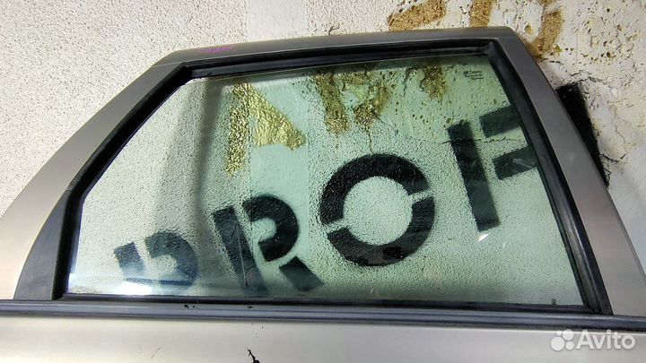 Стекло задней правой двери Лада Калина