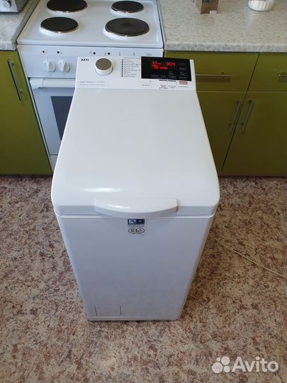 Машина с вертикальной загрузкой AEG на 6кг