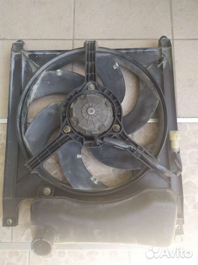 Вентилятор охлаждения двигателя Опель Фронт