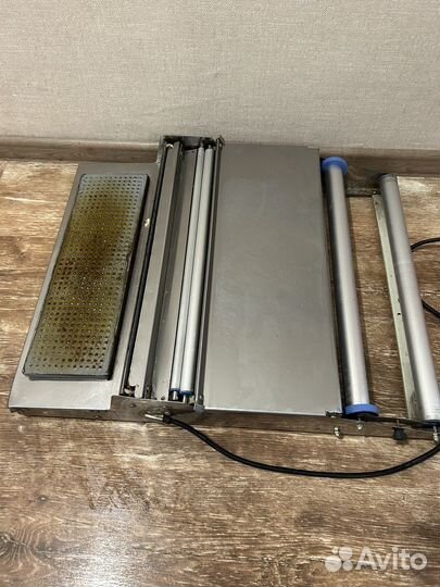 Горячий стол. Упаковщик аппарат